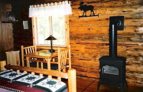 Silverwolf Log Chalets Coram Экстерьер фото